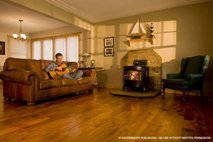 furnished living room with Douglas Fir flooring reclaimed from a torn down warehouse